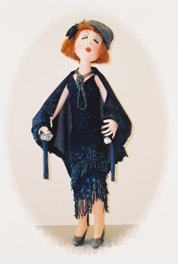 Abigail Anne Asbury is a delightful "Flapper" doll, with style and sophistication. She is designed using the techniques taught in Judi Ward's Design Your Own Dollclasses (beginner and advanced.)