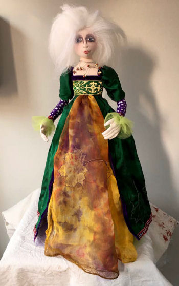 Lady of Avalon is a stump doll pattern. She is 18" tall.