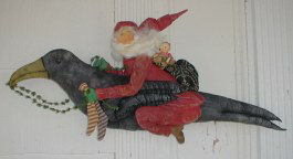 Fabulous vintage Santa soaring on a 36" crow. Patterns for stockings and