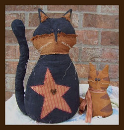 These rustic, weighted 15” cat and 8” kitten would make great doorstops. 