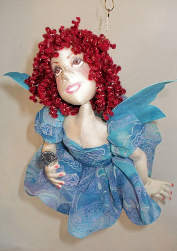 This 14" flying Tooth Fairy is constructed so she moves making her look like she is in flight! 