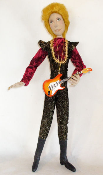 This doll is 20" of Rock attitude and stardom and is wired to stand alone. - Rock Star