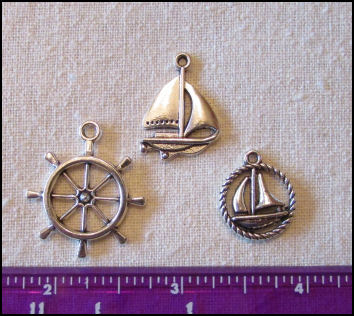 Steampunk Trinkets - Nautical Theme for Art Dolls - Silver sailboat, ship's wheel, & rope circle sailboat