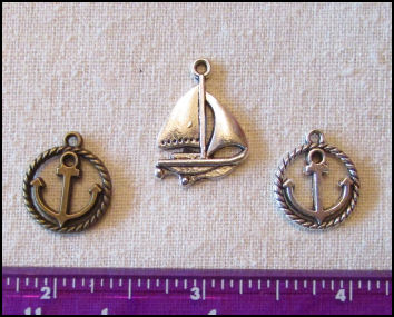 Steampunk Trinkets - Nautical Theme for Art Dolls - Silver Sailboat, silver ripe circle anchor, & bronze rope circle anchor 