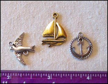 Steampunk Trinkets - Nautical Theme for Art Dolls -  Gold sailboat, silver rope circle sailboat, and silver bird/seagull