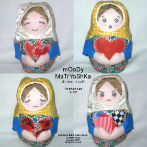 Moody Matryoska CD - This 8-1/2" cloth doll features an innovative 4-sided face & reversible hood for a total of 8 changeable looks in 1 doll. 