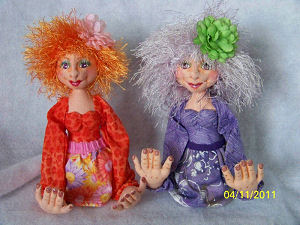 This colorful 7" stump doll that can be made with mitt hands or separate fingers is ready to hold a variety of objects for you – your business cards, your eyeglasses or even your cell phone while it is charging.